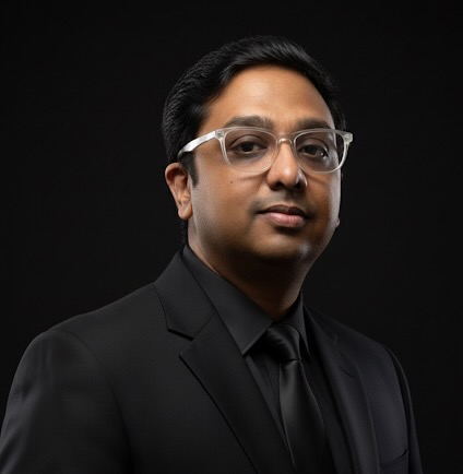 Professional headshot of Rupak Thummala, product leader
